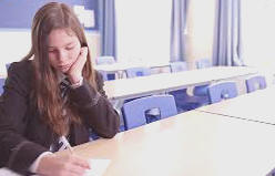 A picture representing a child sitting alone in a classroom can causes a lack of exposure to rich language environment can lead to dyslexia